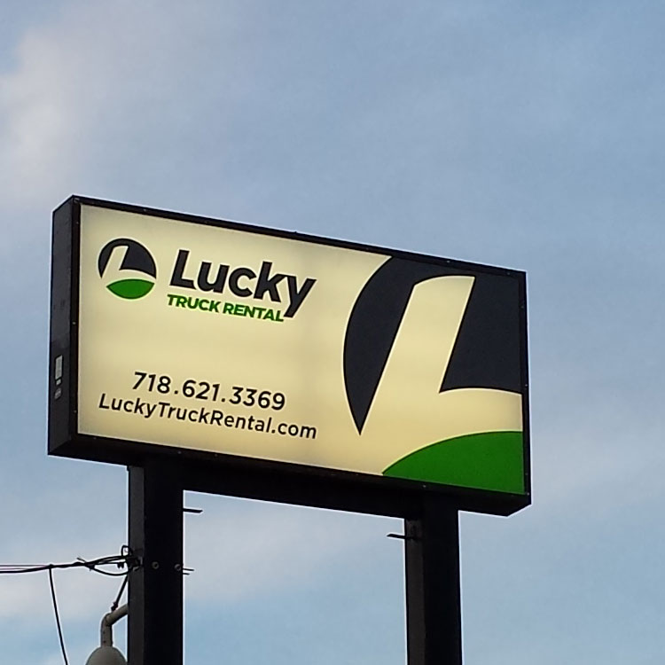 Lucky Truck Rental illuminated pole sign - example of premium signage by SignUp